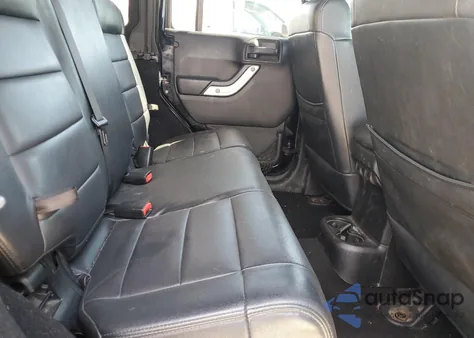 2011 Jeep Wrangler Unlimited Rubicon из США, поврежденный, VIN 1J4HA6H18BL604388